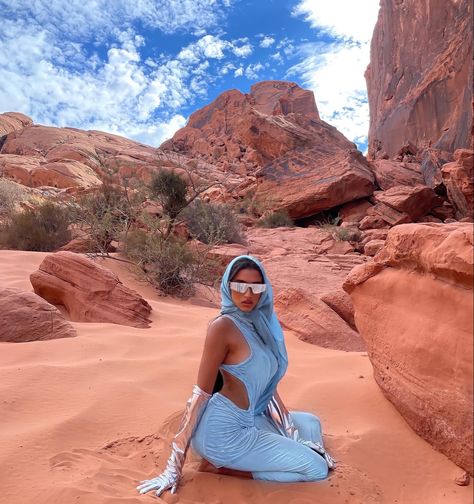 Desert #desert #dubai dubai futuristic glasses trending tiktok #orange #blue wraparound shades #instagram #tiktok #model Desert Photo Shoot Ideas, Desert Editorial Photoshoot, Desert Fits, Desert Look, Arizona Desert Photoshoot, Desert Shoot, Dubai Desert Outfit, Desert Aesthetic Fashion, Desert Grunge