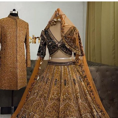 The Ricco on Instagram: "Couture outfits for the Bride and Groom! A stunning combination of bronze mustard with emerald green and intricate bronze beadwork on the beautiful Lehenga, paired with a long veil. A mustard beaded sherwani to compliment the stunning Lehenga ❤️ #custommade #bridalcouture #mustardbridal #orangelehenga #burntorangelehenga #bridallehenga #bridalcoutureweek #weddinglehenga #lehenga #riccoindia #coupleoutfit #couplegoals #weddingoutfit #weddinglehenga #weddingsherwani #sher Orange Lehenga, Beautiful Lehenga, Bridal Couture Week, Latest Bridal Lehenga, Sherwani Groom, Wedding Sherwani, Long Veil, Couture Outfits, Wedding Lehenga