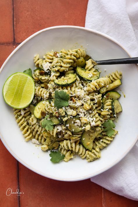 For an unexpected twist on your pasta rotation, try this Cilantro Pesto Pasta with Zucchini. The mouthwatering flavors of Cilantro (Coriander), roasted pepitas (roasted pumpkin seeds), grilled corn and Mexican Cotija cheese shine in this very crave worthy pasta dish. The squash & corn compliment the flavors of the creamy cilantro pesto in this dish perfectly. This is a near perfect Meatless Monday recipe, perfect for your dinner rotation. Pesto Pasta With Zucchini, Pasta With Corn, Roasted Pepitas, Cooking Sweet Corn, Grilled Vegetable Sandwich, Pasta With Zucchini, Corn And Zucchini, Cilantro Pesto, Dinner Rotation