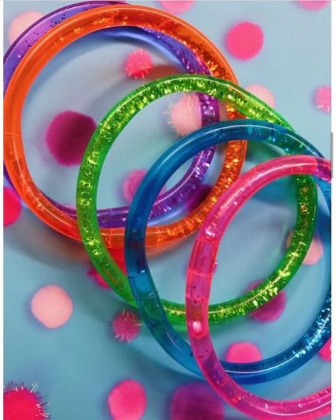 @eightiesgirls on Instagram: "Water & Glitter filled jelly bracelets were the perfect accessory back in the day! Who else wore them? #80s #90s #nostalgia #childhoodmemories #rememberthis #totally80s #ilovethe90s #jellybracelets #80sfashion #90saccessories #blastfromthepast #retro #oldschool #eightiesgirls #80skid" Glitter Bracelets, Old School Things, Angel Y2k, Jelly Bracelets, 90s Accessories, Cute Background, School Things, Bracelets Set, 90s Nostalgia