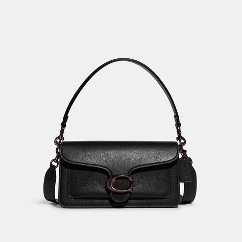 A modern take on an archival 1970s Coach design our structured Tabby shoulder bag is crafted of polished pebble leather. Finished with our Signature hardware for an iconic touch the compact 26 features two detachable straps to carry by hand style as a short shoulder bag or wear crossbody. | Coach Tabby Shoulder Bag 26 - Women's - Pewter/black Small Coach Purse, Coach Bag Black, Coach Black Bag, Mini Coach Bag, Coach Tabby Black, Coach Purse Outfit, Black Designer Bag, Coach Tabby Bag, Coach Tabby 26