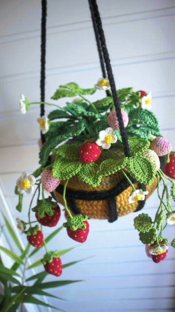 Crochet by Zia on Instagram: "Me thinking that I can recreate this hanging strawberry plant within 3 days is delusion 😌 #crochetstrawberry #crochetstrawberries #strawberry #crochet #crochetfruit #crochetplant #hangingstrawberries #hangingbasket #crochethangingbasket #crochetgifts #crochetflowers #crochetflower #strawberryrajut #rajutindonesia #rajuthandmade #crochethangingplant #crochetstrawberryplant #crochetdecoration #crochethomedecor" Crochet Hanging Flower Basket, Crochet Strawberry Leaf, Crochet Strawberry Basket, Crochet Strawberry Plant Pattern Free, Crochet Plant Basket, Crochet Strawberry Flower, Crochet Strawberry Plant, Strawberry Hanging Basket, Nursery Aesthetic