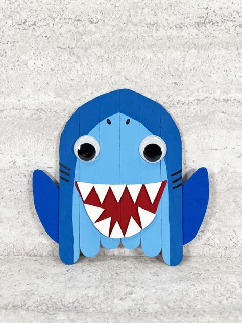 Popsicle Stick Shark Craft for Kids Ocean Unit Study, Shark Crafts, Kids Art Smock, Shark Craft, Diy Popsicle Stick Crafts, Painting Apron, Ocean Unit, Animal Craft, Diy Popsicle