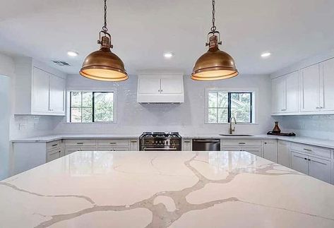 Kitchen with calacatta countertops, island, white cabinets and gold pendant lights Calacatta Alabaster Quartz, Calcutta Classic Quartz Countertop, Calcutta Sol Quartz Countertops, Calcutta Ultra Quartz Kitchen, Calacatta Elysio Quartz, Calcutta Idillio Quartz, Calacatta Idillio Quartz Kitchen, Calacatta Idillio Quartz, Calcatta Quartz Countertop