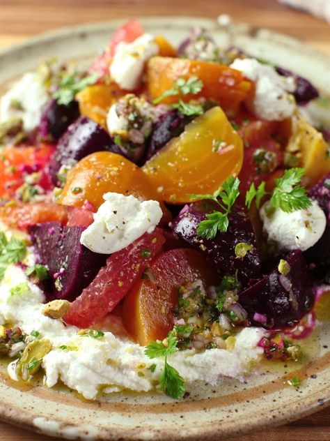 Roasted Beet and Citrus Salad With Ricotta and Pistachio Vinaigrette | Sweet, earthy beets are one of our favorite ingredients for cold-weather salads, and they're even better when paired with tangy citrus. There are a million ways to combine the two—to get started, try this salad made with grapefruit, orange, ricotta, and pistachios. We use juice from the fruit in the vinaigrette to give the salad extra citrus flavor.	  #fallrecipes #autumnrecipes #seriouseats #recipes Pistachio Vinaigrette, Citrus Salad Recipes, Ricotta Recipe, Winter Salads, Fresh Ricotta, Fava Bean, Vinaigrette Recipe, Citrus Salad, Vinaigrette Recipes