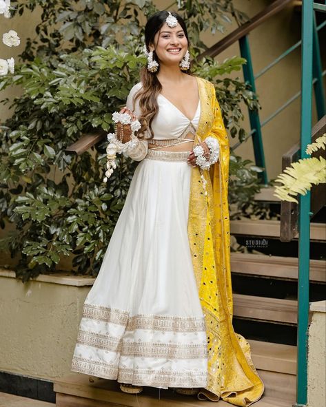 Here's some beautiful Glimpse of Bride #krishnamukherjee from her fun-filled Haldi Ceremony... 💛 #indianbride #indianwedding #couplelove #couplegoals #relationshipgoals #alygoni #jasminbhasin #jasly #jaslyforever #haldiceremony #haldi #haldioutfit #yehhaimohabbatein #karanpatel #divyankatripathi #lehenga #floraldesign #floraljewelry #beautifulbride #yellowdress #ootdfashion #preweddingshoot #preweddingphoto #preweddingphotography #weddinginspiration #weddingdecor #TheFabApp #FabOccasions #FabLi Mehandi Dresses For Brides, Dresses For Brides Sister, Haldi Outfit For Bride Indian, Haldi Dress Ideas For Bride, Haldi Ceremony Outfit For Bride Unique, Haldi Ceremony Outfit For Sister, Unique Haldi Outfits For Bride, Haldi Dress Ideas For Sisters, Wedding Rp