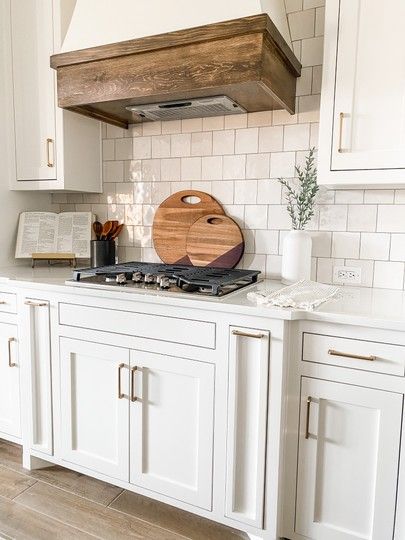 Cream Cabinets With Wood Range Hood, Backsplash For White Kitchen, Magnolia Kitchen Decor, Square Tile Backsplash, Farmhouse Kitchen Backsplash Ideas, Studio Mcgee Kitchen, Backsplash Inspiration, White Kitchen Countertops, Magnolia Kitchen