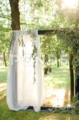 Wedding arch with white veil for photo session. Stock Photos #AD ,#white#veil#Wedding#arch Wedding Bridal Party Photos, Wedding Drapery, Wedding Arches Outdoors, Fabric Draping, Party Fotos, Draping Fabric, Tulle Curtains, Bridal Party Photos, Sheer Drapes