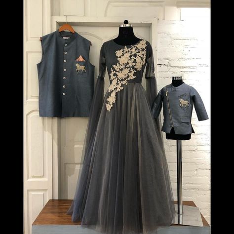 Grey designer gown and kids sherwani. . To inquire whatsapp  91-8888328116 or ethnicdia@gmail.com Combo Dresses For Family, Same Dress For Family Indian, Net Designer Dresses, Kids Sherwani, Mom And Son Outfits, Mom Daughter Matching Dresses, Mom And Baby Dresses, Indowestern Gowns, Net Gown