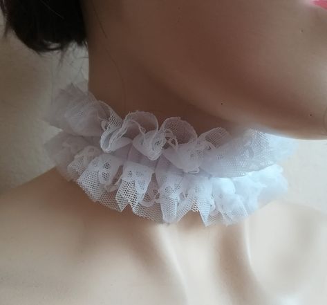 Ruffled lace collar, white lace ckoker.Handmade chic ruffled tulle collar. Organza ribbon ties  can be worn at the front or back of the neck detachable neck collar for women. approximate dimensions COLLAR:  wide 2" length 11- 12"  One size fits all.  adjustable with ribbon or please contact me for other sizes Please check your registered address on Etsy is up to date before purchasing  EXSPRESS SHİPPİNG:  need PHONE NUMBER Express shipping option available for countrys.You can see it when you buy and select your country We recommend you to send your phone number with a message in the fast cargo option. When the cargo does not find you on your adress. The product will not come back to me and it will be destroyed. The seller does not accept responsibility in this case The buyer is responsibl Clown Collar, Neck Ruffle Collar, White Lace Choker, Pierrot Clown, Lace Fingerless Gloves, Ruff Collar, White Chic, Lace Choker, Wedding Gloves