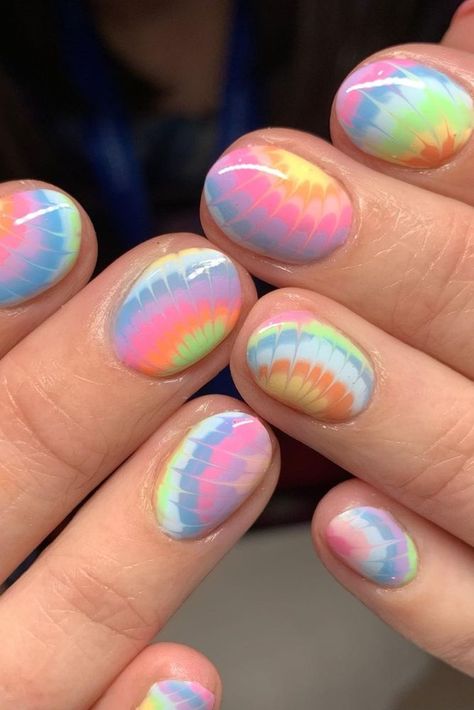 Get ready for summer with these playful and colorful rainbow tie-dye nails! This fun and vibrant nail design is perfect for adding a pop of color to any summer outfit. #summernails #rainbowtiedye #nailart #beauty #naildesign #fun #colorful #style #fashion The Dye Nails, Vibrant Nail Colors, Pride Nails, Nail Goals, Acrylic Nail Shapes, Summer Nail Designs, Hippie Nails, Tie Dye Nails, Amazing Nails