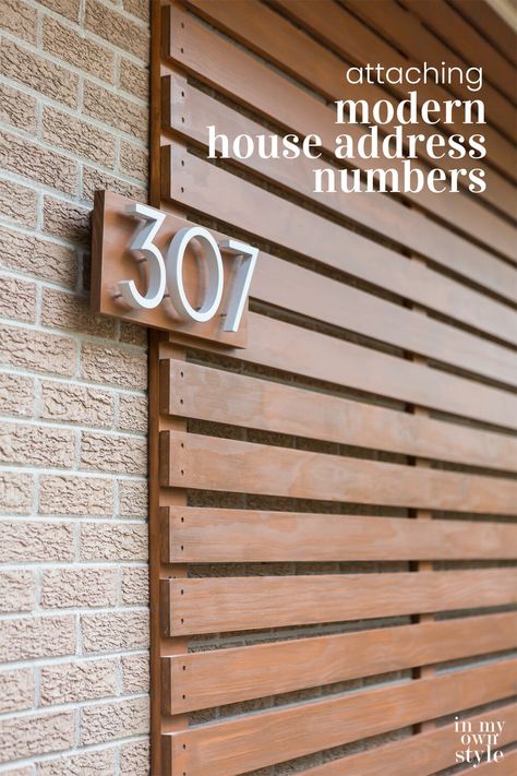 How to attach floating modern house address numbers to house. #houseaddressnumbers #modernexterior #modernhome Cool Address Numbers, Mcm Patio, Wall Stains, Trim Colors, Wood Slat Wall, Home Exterior Makeover, Modern House Number, Wall Exterior, Exterior Makeover