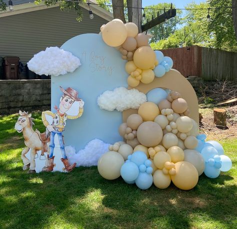 A Boy Story ☁️ Such a cute baby shower theme! Thank you @alejandrawink for trusting me!! Balloons Used @kalisanballoons White Sand… | Instagram It’s A Boy Story Baby Shower Centerpieces, Boy Toy Story Baby Shower Theme, Baby Boy Themed Baby Shower Ideas, Baby Shower Toy Story Theme, Birthday Theme For Boys 1st, It’s A Boy Story, A Boy Story Baby Shower Ideas, Its A Boy Story Baby Shower Ideas, Baby Shower For Boys Theme