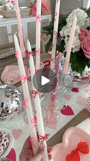 Aurelie Erikson on Instagram: "Taking ordinary candle sticks and turning them into Valentine's works of art. 🎀🕯️ I added delicate wax bows that are effortlessly glam and so easy to make. The perfect touch of elegance and love for your cozy evenings! 🕯️💋  save & share with a friend who needs a craft night 🫶🏼🎀  🔗 to wax strips I used in my Amazon storefront in bio  . . . . . #valentinedecor #valentinesdiy #diyvalentines #girlsnight #galentinesday #galentinesdayparty #galentines #valentineparty #diyhomedecor #diycrafts #diyideas #diycrafts #diytutorial #pinkaesthetic #bowsbowsbows #coquette #bowseason #diybows" Aurelie Erikson, Bow Candle, Bow Centerpiece, Valentine Candle, Bow Season, Valentine Words, Clay Making, Diy Wax, Wax Strips