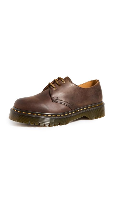 PRICES MAY VARY. The solid style of the Dr. Martens 1461 Bex shoe lets you dress them up or dress them down to match your everyday style. Crazy Horse is a heavyweight leather with a tough, textured appearance — designed to look worn in from the first step Includes classic Doc's DNA like yellow welt stitching, three eyelets, and a grooved air-cushioned sole. Traditional lace-up closure with sturdy fabric laces and metal eyelets for a secure fit. Goodyear welt construction where the upper and sole Crazy Horse Doc Martens Outfit, Crazy Horse Doc Martens, Brown Doc Martens Outfit, Brown Docs, Dr Martens Bex, Doc Martens Oxfords, Doc Martens Loafers, Brown Doc Martens, Shoes To Buy