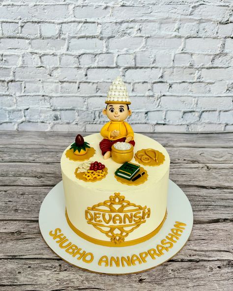 Rice Ceremony/ Annaprashan Cake of Baby Devansh. Order your dream cake today and turn every celebration into an unforgettable memory. To order, DM/ WhatsApp on 6290789972. Follow @hotcrossbunsguwahati for creative cake inspirations. [Cakes, Desserts, Buttercream Cake, Theme Cake, Fondant Cake, Rice ceremony, Annaprashan, Baking, Foodie, Cake lover, Baker, Homebaker, Cake decorating, Cakes for you, Cake ideas, Cake inspiration, Guwahati, Kolkata, Guwahati Bakery] ##hotcrossbunsguwahati ... Annaprashan Cake Ideas, Rice Ceremony Cake, Rice Ceremony, Cake Designs For Boy, Bal Hanuman, Cake Fondant, Hot Cross Buns, Cross Buns, Decorating Cakes