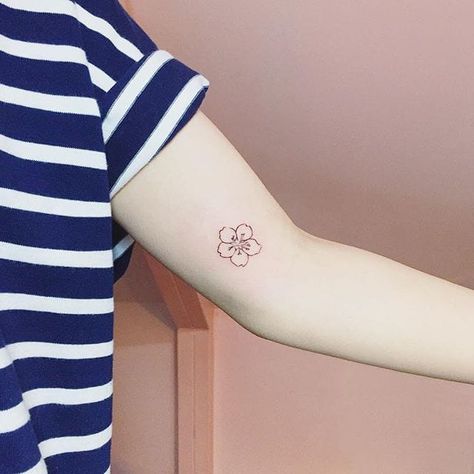 Cherry blossom tattoo by Ida. #linework #miniature #flower #cherryblossom #tiny… Japanese Tattoo Women, Sakura Tattoo, Tattoo Tiny, Borneo Tattoo, Japanese Tattoo Symbols, Typography Tattoo, Muster Tattoos, Delicate Tattoo, Japanese Sleeve Tattoos