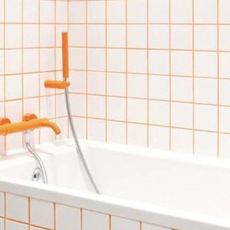 National Tiles on Instagram: "Coloured grout is having a real moment, if you want to use a simple cost effective white tile with a fun stylish edge, coloured grout can make a statement. Our experts in store can help you find the best combination and bring your vision to life!" White Tile Orange Grout, White Tile Coloured Grout, Orange Grout, Orange Bathrooms, Coloured Grout, Tub Time, Grout, Upstairs Bathrooms, White Tiles