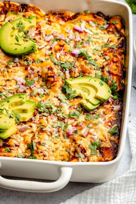 Amazing chicken enchiladas with creamy refried beans, protein-packed chicken, and a homemade enchilada sauce. This delicious, easy chicken enchilada recipe is freezer-friendly and a crowd-pleasing dinner staple! #enchiladas #dinner #healthydinner #chicken Weeknight Mexican Dinner, Crowd Pleasing Dinners, Rachel Good Eats Recipes, Semi Healthy Dinners, Ground Chicken Enchiladas, Protein Packed Dinners, Make Ahead Dinners, Enchiladas Dinner, Creamy Refried Beans