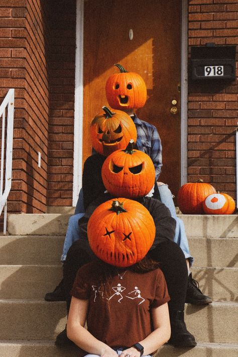 A fun way to document the halloween season - grab your friends or family & start carving your pumpkins from the bottom up! Bonus points for spooky pumpkins doing every day things 🎃 head to Lightroom or your favorite editing app & get that grainy, vintage look started. halloween | pumpkins | photography | fall fun | friends | roommates | spooky season | pumpkin spice | pumpkin carving | fall photos | this is halloween | scary Pumpkin Carving Ideas Photoshoot, Pumpkin On Head Photoshoot Friends, Pumpkin Carving Pictures Friends, Carved Pumpkin Photoshoot, Pumpkin Head Group Photoshoot, Pumpkin Head Family Photos, Halloween Group Pictures, Pumpkin Head Photoshoot Friends Black, Pumpkin Carving Photoshoot