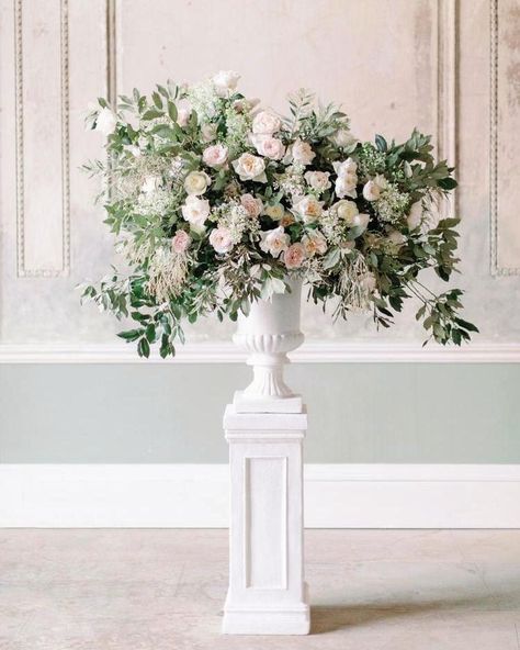 Urn Floral Arrangements Wedding, Urn Wedding Arrangements, Urn Vase Floral Arrangements, Wedding Urn Flowers, Floral Urns Wedding, Altar Florals, White And Pink Wedding Flowers, Pastel Themed Wedding, White And Pink Wedding