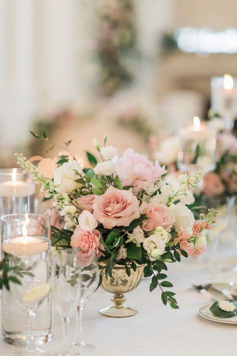 Planning your dream wedding? Don't underestimate the power of a professional wedding planner by your side. Contact us today to start planning your wedding day! #WeddingPlanningMagic #StressFreeBride #DreamWeddingGoals #WeddingPlannerPro #UnforgettableCelebrations" Green Pink And Gold Wedding, Blush And Gold Wedding Decor, Pink Wedding Arrangements, Rose Table Centerpiece, Round Tablescapes, Centerpiece Flower Arrangements, Fairytale Flowers, Blush Pink Wedding Flowers, Fairytale Wedding Theme