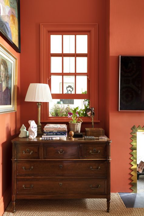 sitting room with red walls and sisal carpet Red Walls Living Room, Antique Room Aesthetic, Red Living Room Walls, Maximalist Decor Vintage, Cavern Clay, Orange Interiors, Living Room Sconces, Eclectic Interior Design Vintage, Coloured Walls