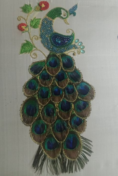 This peacock is made by original feathers of peacock Peacock Feather Blouse Design, Aari Stitches, Ombre Saree, Peacock Embroidery Designs, Peacock Embroidery, New Embroidery Designs, Antique Gold Jewelry Indian, Aari Work Blouse, Work Blouses