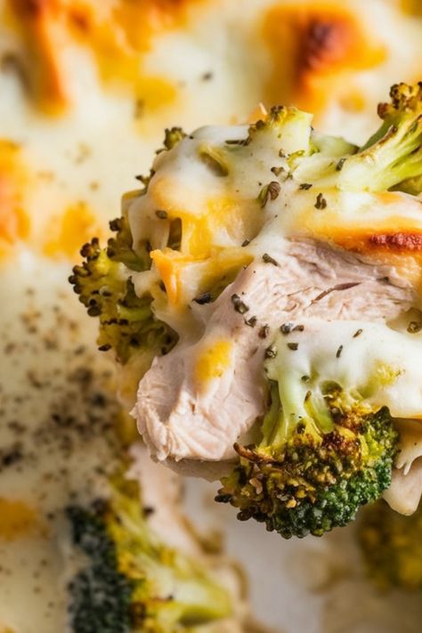 Chicken and broccoli covered in melted cheese and herbs. Keto Chicken And Green Beans, Keto Cheesy Broccoli, Keto Chicken Casserole Recipes, Keto Chicken And Broccoli, Broccoli And Chicken Casserole, Keto Crockpot Chicken, Keto Cheesy Chicken, Chicken Broccoli Cheese Casserole, Shredded Chicken Casserole