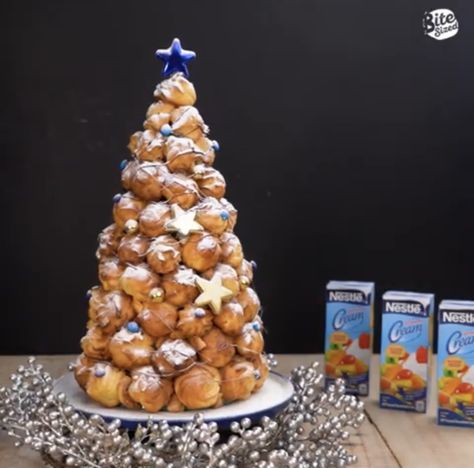 Cream Puff Trees #caramel #christmas #creampuffs #creamy #dessert #festive #holiday #nestlé #vanilla Cream Puff Christmas Tree, Cream Puff Tree, Christmas Cream Puffs, Cream Puff Tower, Cream Filled Puff Pastry, Cream Puff Dough, Caramel Christmas, Mini Cream Puff, Cream Puff Dessert