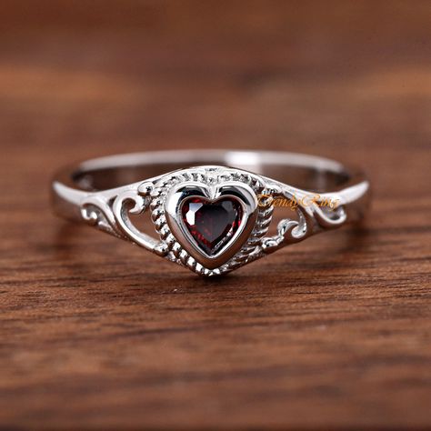 Solid 925 Sterling Silver 4mm January Birthstone Dark Red Garnet Color Heart CZ Bezel Set Rope Filigree Baby Girls Childrens Teens Ring ▷Gift Box Included ▷7mm Height ▷Size 1 - 12 Available ▷925 Sterling Silver (not plated or filled) ▷925 Stamp Authenticity ▷High-Quality Cubic Zirconia Used https://www.etsy.com/shop/TrendyRing Dark Red Ring, Grandma Jewelry, Teen Ring, Garnet Color, Color Heart, Dope Jewelry, Garnet Jewelry, January Birthstone, Funky Jewelry