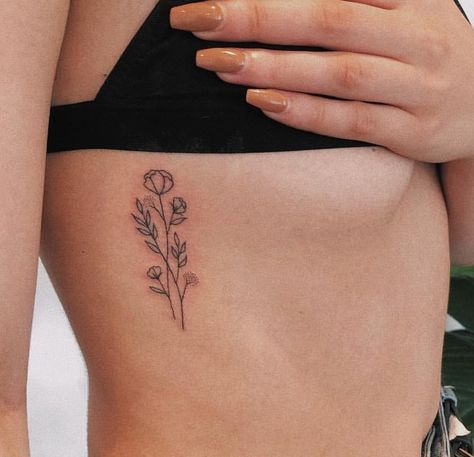 Small Ribcage Tattoos For Women, Small Tattoos On Ribs, Birth Flower Tattoo Ribs, Flower Tattoo With Date, Flower On Ribs Tattoo, Birth Flower Tattoos On Ribs, Birth Flower Rib Tattoo, Small Rib Flower Tattoo, Small Flower Tattoo Placement