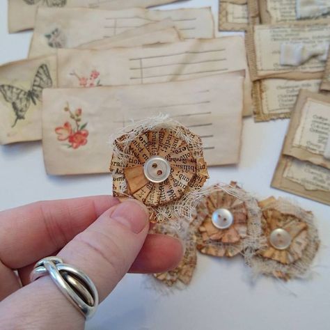 Making embellishments and stuff for my junk journals - everything is coffee dyed paper, some vintage dictionary pages, cheesecloth, old note sheets, napkins, stamping, lace, and more. ☺ #handmade #coffeedyed #junkjournals #handmadeenvelopes #crafting #paperart #decor #paper Small Fabric Folds For Junk Journals, Junk Journal Flowers, Junk Journal Embellishments Ideas, Junk Journal Embellishments Ephemera, Book Paper Crafts, Vintage Dictionary Pages, Coffee Dyed Paper, Junk Journal Embellishments, Vintage Paper Crafts