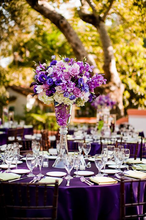 Table setting at outdoor reception - Purple tablecloth with purple, lavendar, ivory, and dark blue floral centerpiece - wedding photo by Michael Norwood Photography only dark blues and oranges @Chantelle Wilson Wilson Andosca Dark Purple Wedding, Purple Tablecloth, Purple Centerpieces, Blue Centerpieces, Themes Wedding, Purple Wedding Theme, Wedding Photo Gallery, Reception Centerpieces, Table Set Up