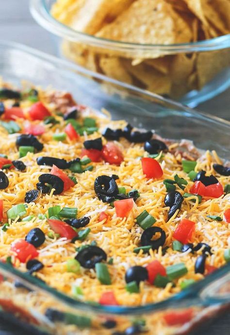 The BEST Tex-Mex 7 Layer Bean Dip | The Kitchen Magpie 7 Layer Mexican Dip, Recipe With Black Beans, Layer Dip Recipe, Mexican Dip Recipes, 7 Layer Bean Dip, 7 Layer Dip Recipe, Mexican Layer Dip, Mexican Dip, Layered Dip Recipes