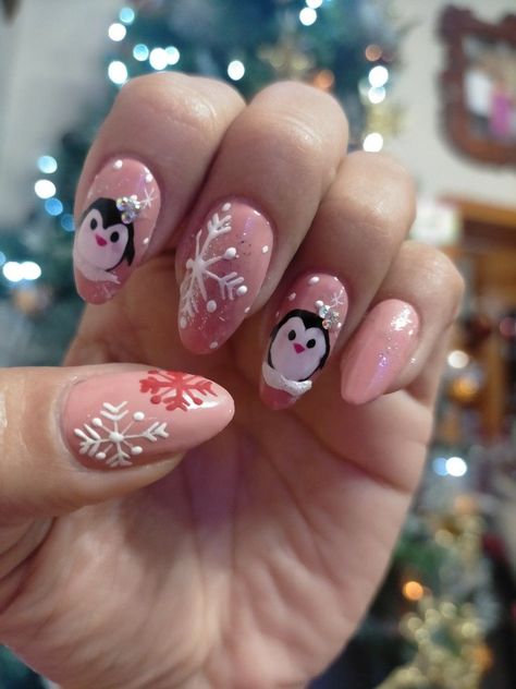 Celebrate the magic of Christmas with these festive nail art designs! 🌟 Whether you prefer classic red and green or want to experiment with glittery designs, explore these amazing ideas to elevate your holiday look! #NailDesigns #HolidayNails Pink Penguin Nails, Penguin Christmas Nails, Penguin Nail Designs, Christmas Nails Penguin, Penguin Nail Art, Mom Nails, Penguin Nails, Winter Nail Art Designs, Year Nails