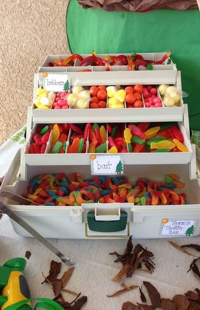 Fish Theme Candy Bar, Hunting Fishing Birthday Party, Duck Hunting Decorations Party Ideas, Hunting And Fishing Birthday Party, Bait Bar Fishing Party, Camping Treats, Campfire Birthday, Gummy Fish, Camp Birthday