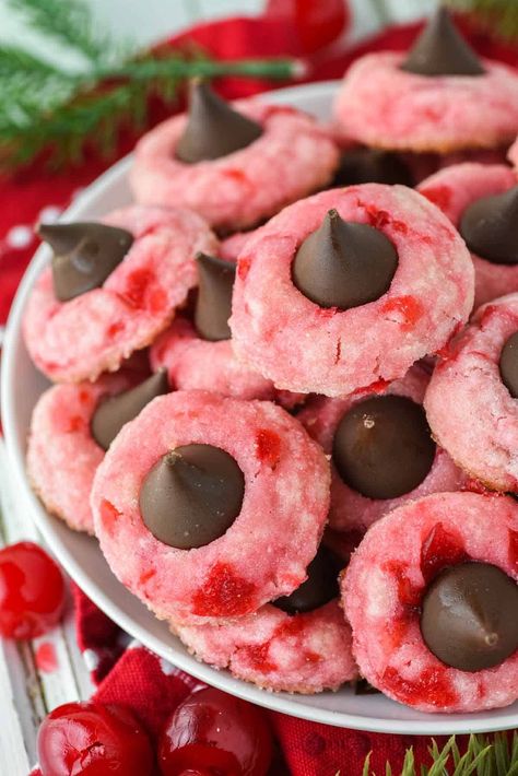 With maraschino cherries in the cookie dough and a Hershey kiss in the middle, these cherry blossom cookies are the perfect holiday treat. #cherryblossomcookies #cherrykisscookies #cookies | chiselandfork.com Cheddar Mac And Cheese Recipe, Pepperoni Bread Recipe, Cherry Blossom Cookies, Pepperoni Bread, Cheddar Mac And Cheese, Cherry Cookies, Maraschino Cherries, Blossom Cookies, Kiss Cookies