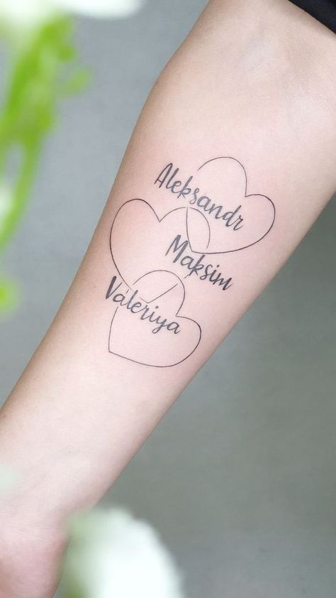 Tattoo Ideas For Two Kids, Tattoo Ideas For 4 Kids, Mother Of 3 Tattoo Ideas With Names, 3 Name Tattoo Ideas, 3 Heart Tattoo Ideas, Mom And Kids Tattoo Ideas, 3 Kids Tattoo Ideas, Tattoo With Kids Names For Moms, Tattoos For Kids Names