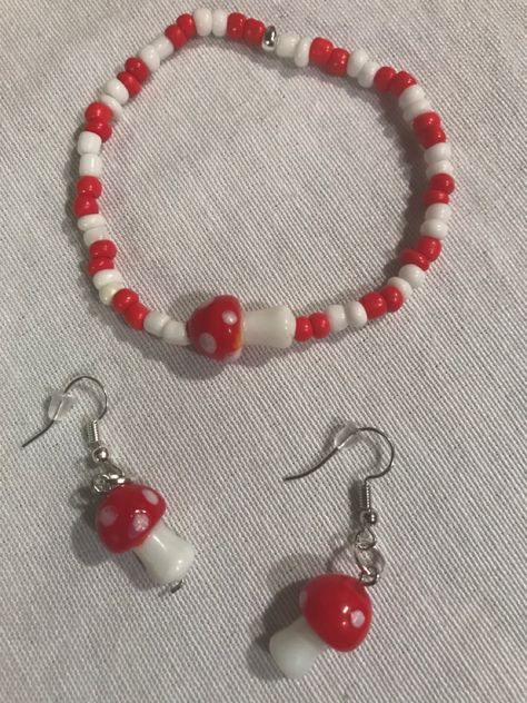 Red mushroom bracelet and earrings Mushroom Accessories, Mushroom Bracelet, Im Okay, Diy Kandi Bracelets, Diy Kandi, Bracelet Stand, Red Mushroom, Kandi Bracelets, Bead Charms Diy