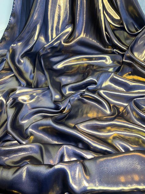 "1 mtr navy/gold shimmer on satin fabric This is quality fabric and is silky satin fabric It is 58\" wide (147cm) This is ideal for dress making lining,bridal dress lining, waiste coat,decorations,table runners, and many other projects If more than one quantity is bought it will be sent in one continous length All items are dispatched within one working day (Please note i try my best to get exact color of the fabric there might be a slight different in color due to different montior screens and camera lighting) Any questions feel free to ask and please take time to look at my shop" Silky Navy Blue Dress, Cool Fabrics, Blue And Gold Aesthetic, Satin Aesthetic, Metalic Fabric, Fantasy Fabric, Galaxy Fabric, Space Dress, Dress Lining