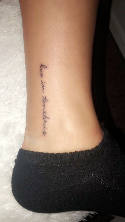 lux in tenebris ankle tattoo Lux In Tenebris, Latin Tattoo, Wörter Tattoos, Tattoo Ankle, Ankle Tattoo Designs, Ankle Tattoos For Women, Tattoo Prices, Writing Tattoos, Tattoo Script