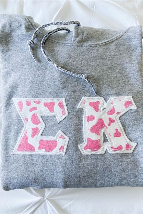 Sorority Stitched Letters, Sorority Activities, Sorority Shirts Letters, Big/little Baskets, Sigma Kappa Sorority, Greek Letter Shirts, Pink Cow Print, Stitched Letters, Stitch Letters