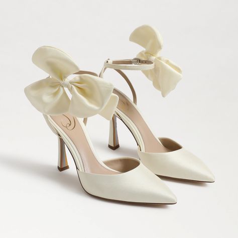 Special occasions call for these stunning stilettos. A head-turning bow detail and sleek silhouette will secure your best-dressed guest status.. Heel Height: 3.8 inches. Toe: Pointed Toe. Closure: Buckle. Material: Synthetic, Fabric, & Other. Insole: Synthetic.  . Bow High Heels, Bridal Heels, Bow Heels, Bow Shoes, Wedding Heels, Bride Shoes, Strap Pumps, Wedding Looks, Sam Edelman Shoes