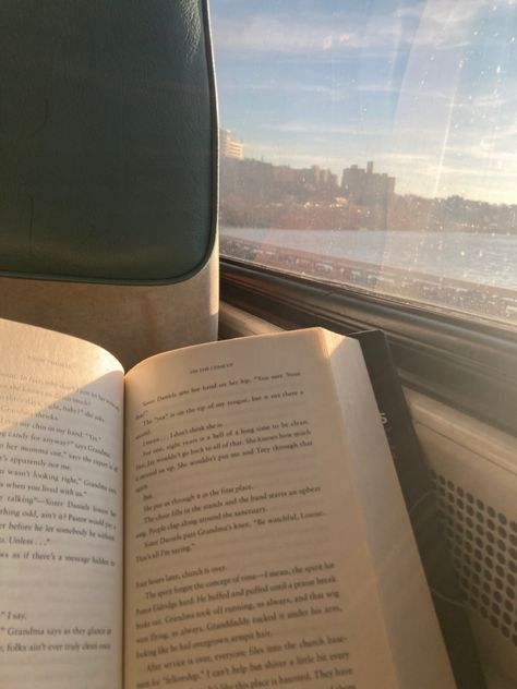 Open book resting against a train seat, pretty scenery from a train window is in the background Reading Train, Metro Train Aesthetic, Reading On Train, Train Aesthetic, Instagram Post Captions, Nostalgia Aesthetic, Book Instagram, First Job, Peaceful Life