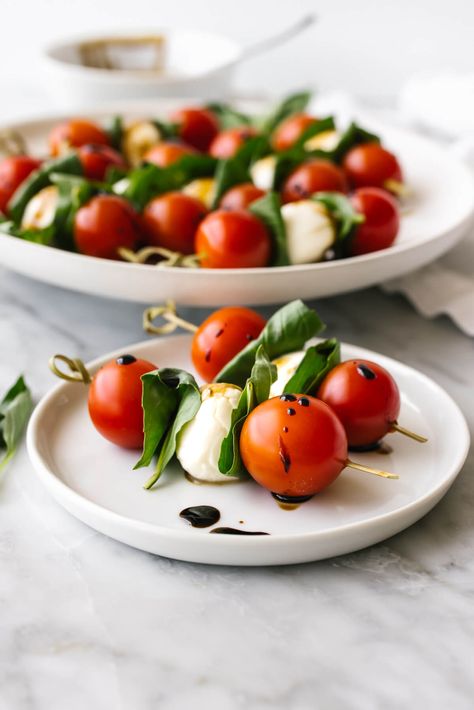 These flavorful caprese skewers are the perfect appetizer for your next party! They're threaded with tomatoes, mozzarella, basil, and a drizzle of balsamic glaze. Mozarella Appetizer Cherry Tomatoes, Mini Mozzarella Ball Appetizers, Pumpkin Fondue, Tomato Skewers, Mini Mozzarella Balls, Girls Dinner, Mozzarella Balls, Caprese Sandwich, Tomatoes Mozzarella