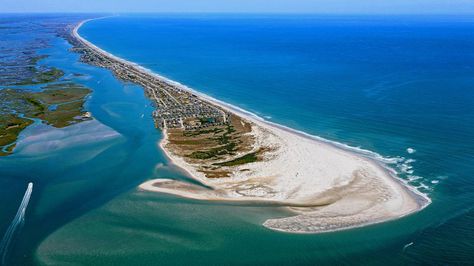 Topsail Island, North Carolina | Cruise this coast for bucket-list worthy beaches. Any way you slice it, North Carolina has lucked out as a state with options. With its charming mountain towns, bustling cities, and quiet sandy beaches, North Carolina makes the cut on any travel list—and we just love exploring every trail-blazing destination, one by one. Summer is high-time for coastal vacations, but fall provides a welcome respite from the sweltering heat at our very favorite North Carolina beac Topsail Island Nc, Topsail Beach Nc, Nc Beaches, North Carolina Coast, North Carolina Vacations, Best Beaches To Visit, Topsail Island, North Carolina Beaches, Topsail Beach