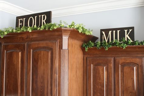 Greenery Above Kitchen Cabinets, Kitchen Decor Above Cabinets Ideas, Plants Above Kitchen Cabinets, Top Of Cabinet Decor, Decor Above Kitchen Cabinets, Top Of Kitchen Cabinets, Decorating Above Kitchen Cabinets, Top Of Cabinets, Above Cabinets