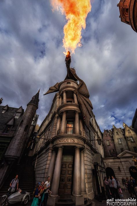 https://flic.kr/p/22ZkXAG | Gringotts' Dragon | The dragon is making his escape from Gringotts.  Now who will protect the wizards' and witches' treasures now?  Shot at the HP Celebration at Orlando, FL. Gringotts Dragon, Book Journaling, Orlando Fl, The Dragon, Empire State, Empire State Building, Orlando, Witch, Tattoos