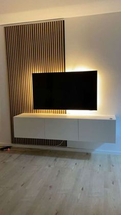 Wall Painting Tv Room, Wooden Panels Behind Tv, Wood Slat Living Room, Panelling Around Tv, Acoustic Panels Living Room, Panel Behind Tv, Slat Wall Behind Tv, Panel Media Wall, Panelling Behind Tv